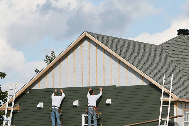 Professional Siding Contractor technician working in Calhan, CO